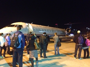 Tiny planes freak me out. I tried my best not to think about it. Here we are waiting on our carry-on luggage. 