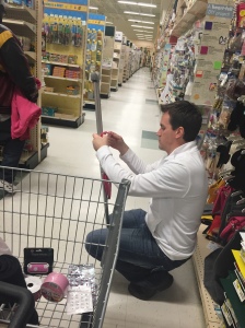 Joe checking to make sure this felt "pouch" will hang correctly on my crutches. 