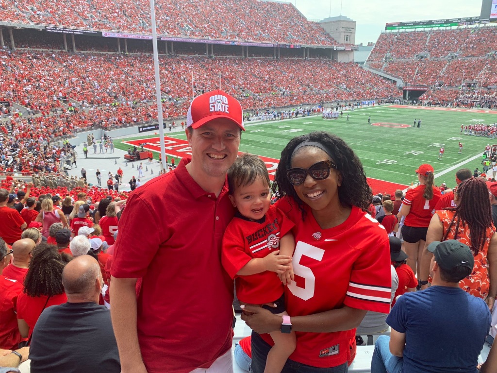 Photo of Joe, Alissa and Alexander at an OSU football game. 